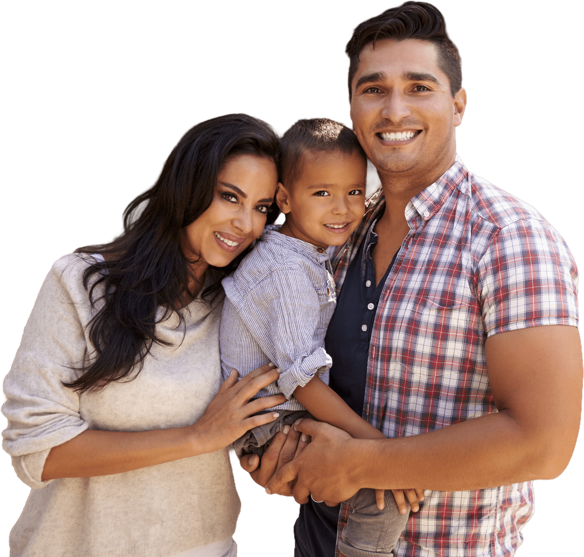 A smiling family of three poses together, with the parents holding their young son, showcasing a moment of joy and togetherness.